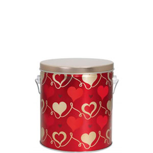 A red 1-gallon popcorn tin with hearts on it